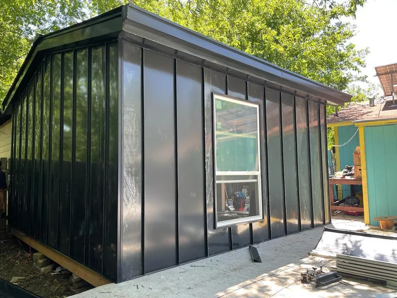 Black standing seam metal wall panels for Roof Inspection in Windsor